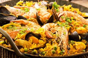 Seafood paella paired with wine