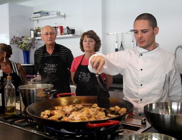 Chef preparing paella in Seville